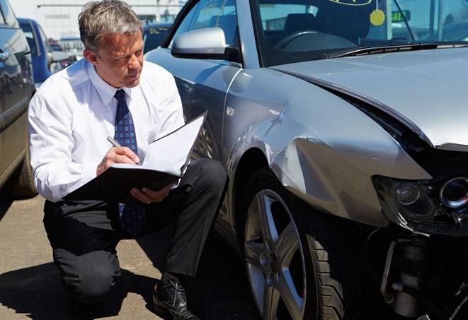 car insurance agent explaining coverage options